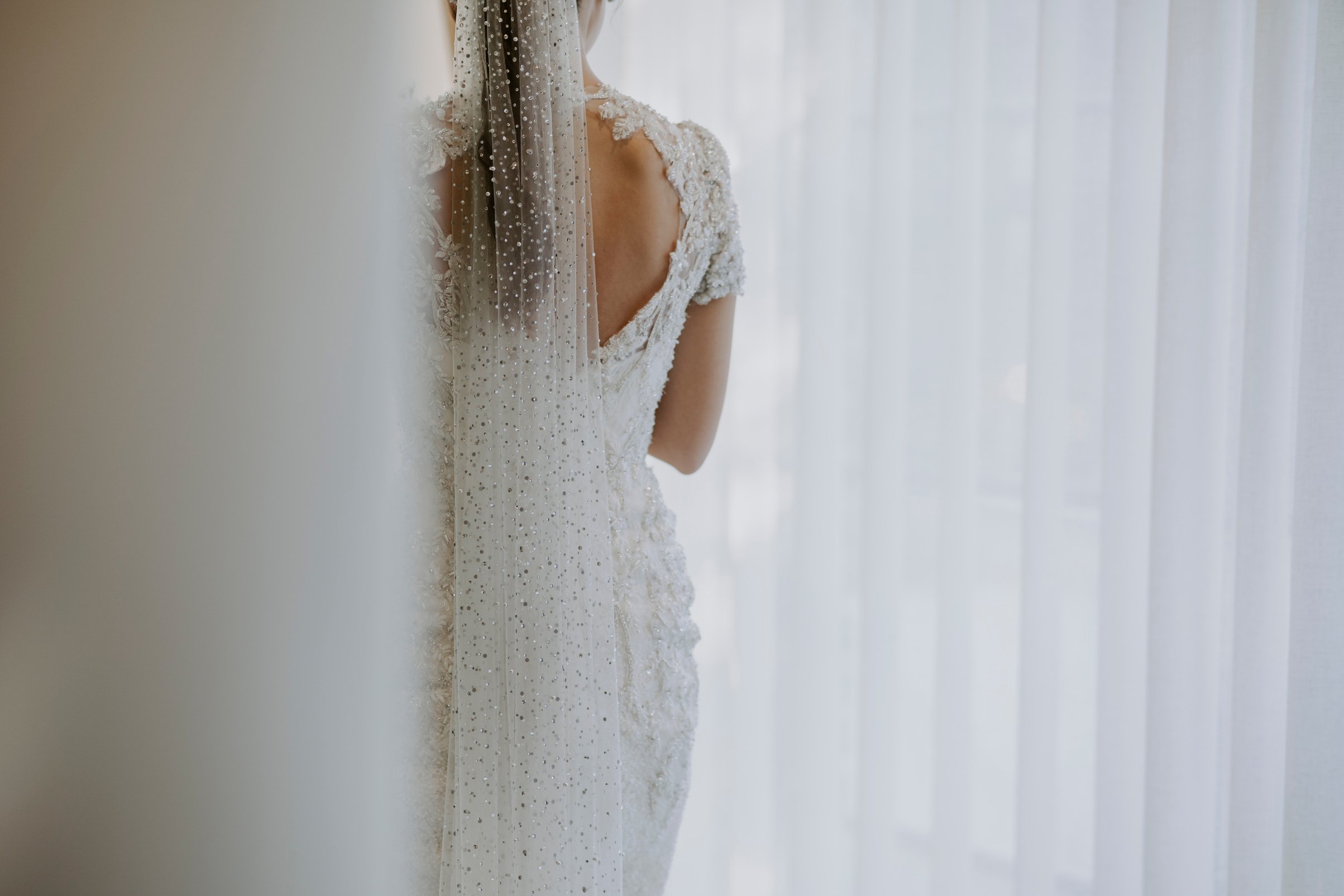 Bride in White Wedding Dress and Veil